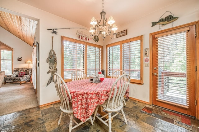 41811 Gray Rock Rd, Shaver Lake, CA 93664 - dining room with plenty of natural light, a notable chandelier, and stone tile flooring