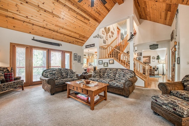 41811 Gray Rock Rd, Shaver Lake, CA 93664 - living area with high vaulted ceiling, carpet flooring, stairway, and wood ceiling