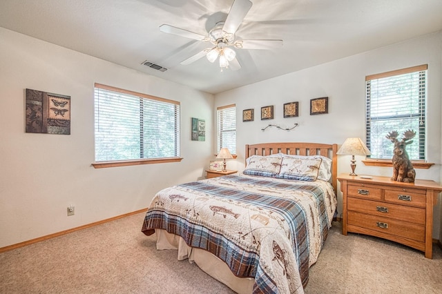 41811 Gray Rock Rd, Shaver Lake, CA 93664 - bedroom featuring visible vents, light colored carpet, baseboards, and ceiling fan