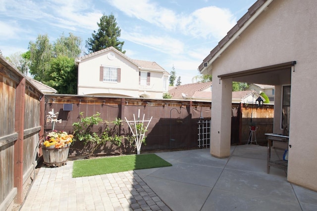 view of patio with a fenced backyard