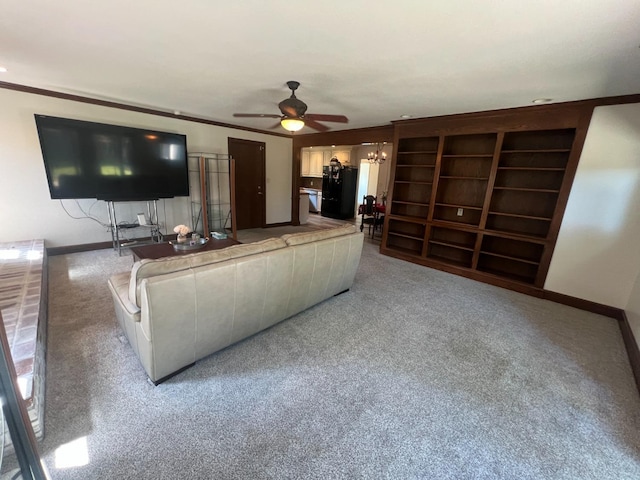 1450 W Chennault Ave, Fresno, CA 93711 - living room with carpet floors, crown molding, baseboards, and ceiling fan