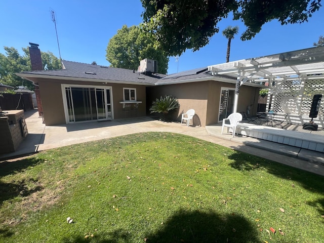 1450 W Chennault Ave, Fresno, CA 93711 - rear view of property with a pergola, a chimney, central air condition unit, a patio, and stucco siding
