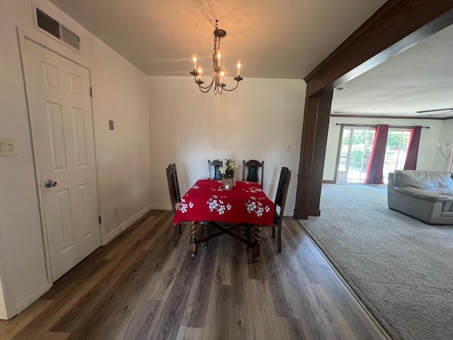 1450 W Chennault Ave, Fresno, CA 93711 - dining room with an inviting chandelier, wood finished floors, visible vents, and baseboards