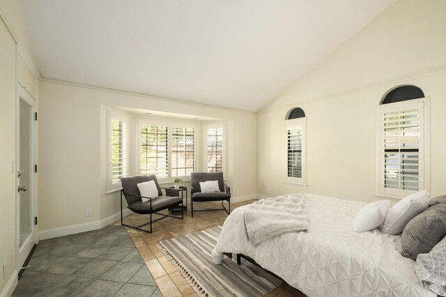 10001 N Pheasant Run Dr, Fresno, CA 93730 - bedroom with baseboards and high vaulted ceiling