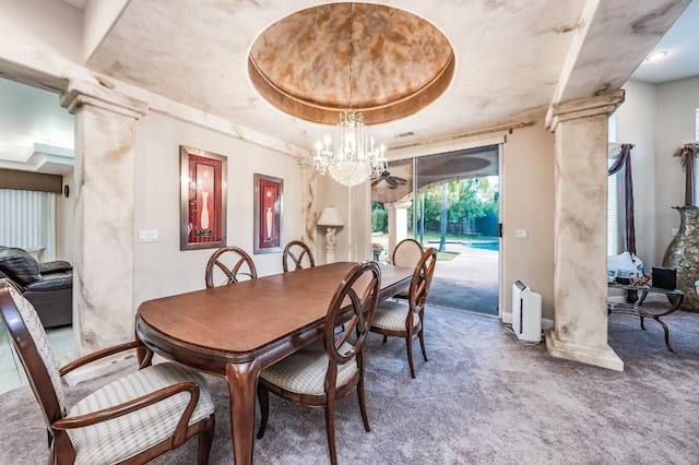 9336 N St Martin Dr, Fresno, CA 93720 - carpeted dining space featuring baseboards, an inviting chandelier, ornate columns, and a tray ceiling