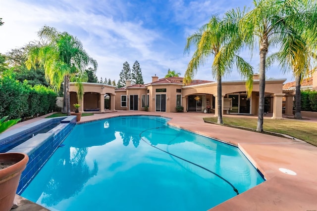 9336 N St Martin Dr, Fresno, CA 93720 - view of pool with a fenced in pool and a patio