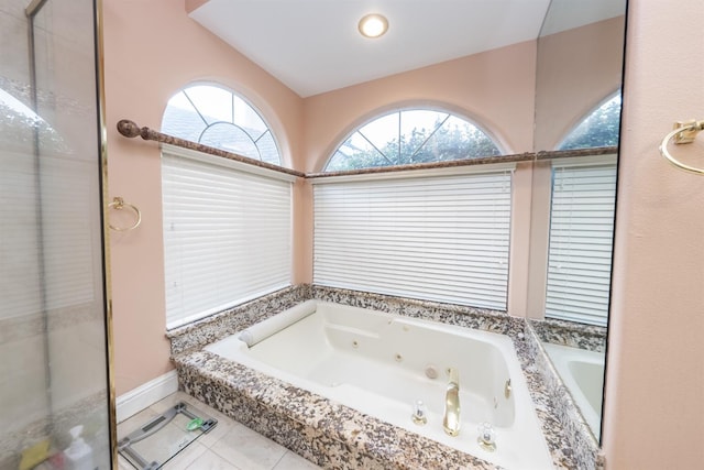 9336 N St Martin Dr, Fresno, CA 93720 - bathroom featuring tile patterned floors and a tub with jets