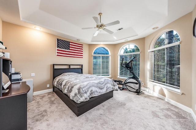 9336 N St Martin Dr, Fresno, CA 93720 - carpeted bedroom featuring visible vents, baseboards, a tray ceiling, and recessed lighting