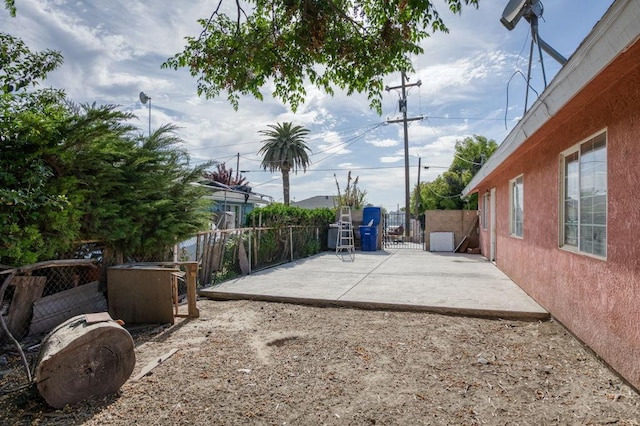exterior space with a gate and fence