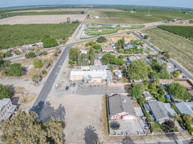 birds eye view of property with a rural view