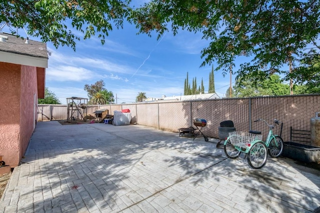 view of patio with a fenced backyard