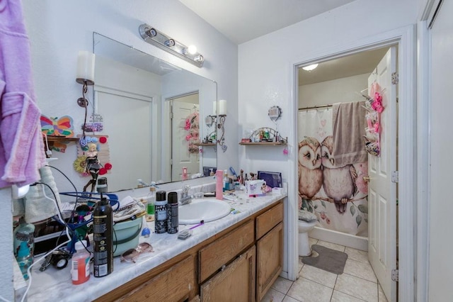 bathroom featuring curtained shower, vanity, tile patterned flooring, and toilet