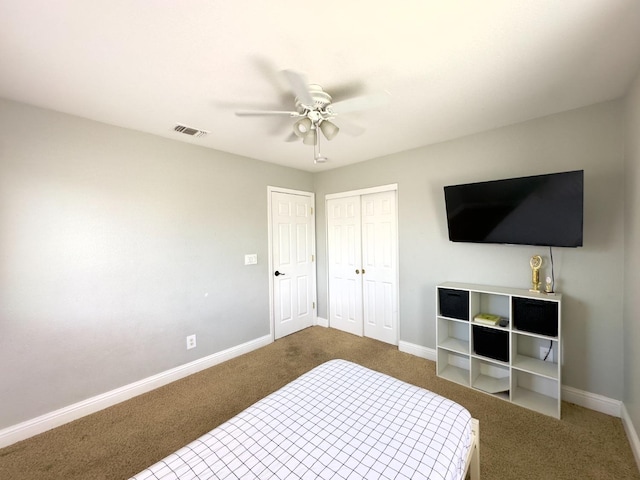 5148 W Pine Ave, Fresno, CA 93722 - carpeted bedroom with baseboards, a ceiling fan, visible vents, and a closet