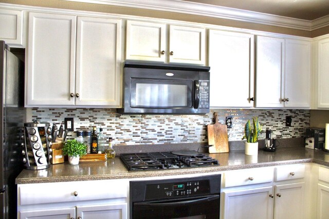 5148 W Pine Ave, Fresno, CA 93722 - kitchen with tasteful backsplash, white cabinetry, black appliances, and crown molding