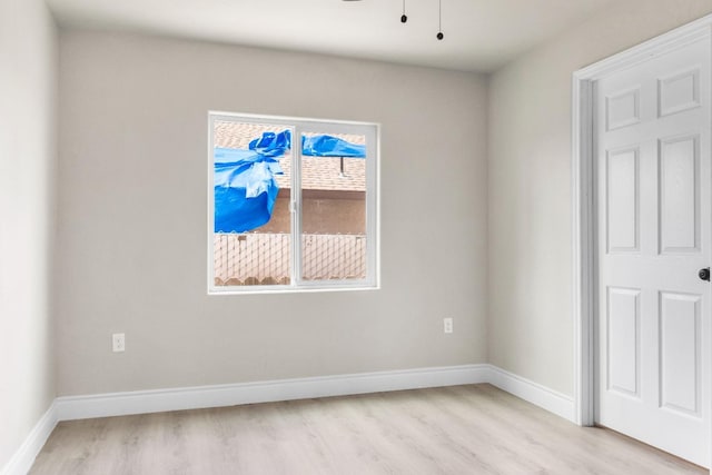 3659 Mono St, Fresno, CA 93702 - spare room with light wood-style flooring and baseboards