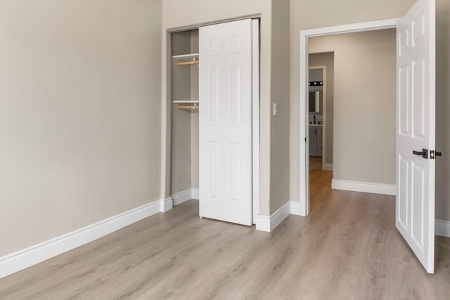 3659 Mono St, Fresno, CA 93702 - unfurnished bedroom featuring light wood-style flooring and a closet