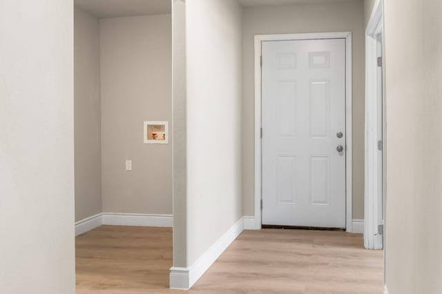 3659 Mono St, Fresno, CA 93702 - hallway featuring light wood-style flooring and baseboards