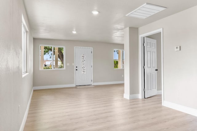 3659 Mono St, Fresno, CA 93702 - entrance foyer featuring light wood-style flooring and recessed lighting