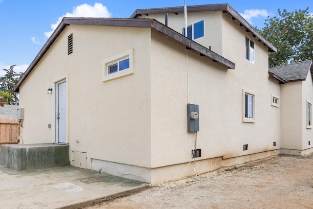 3659 Mono St, Fresno, CA 93702 - view of side of property featuring stucco siding and roof with shingles