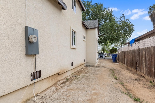 3659 Mono St, Fresno, CA 93702 - view of home's exterior featuring stucco siding and roof with shingles