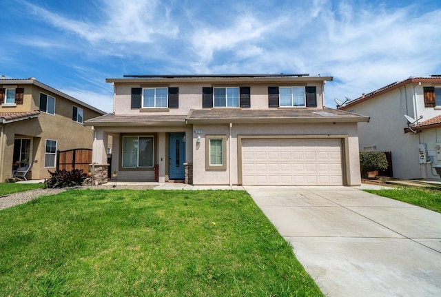 traditional-style home featuring roof mounted solar panels, stucco siding, concrete driveway, a front yard, and a garage