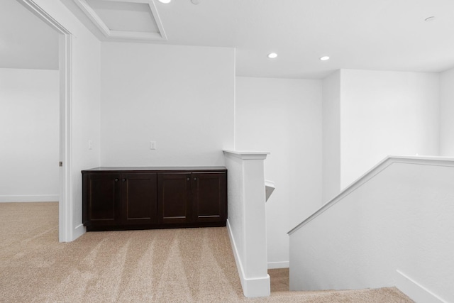 staircase featuring recessed lighting, carpet, baseboards, and attic access