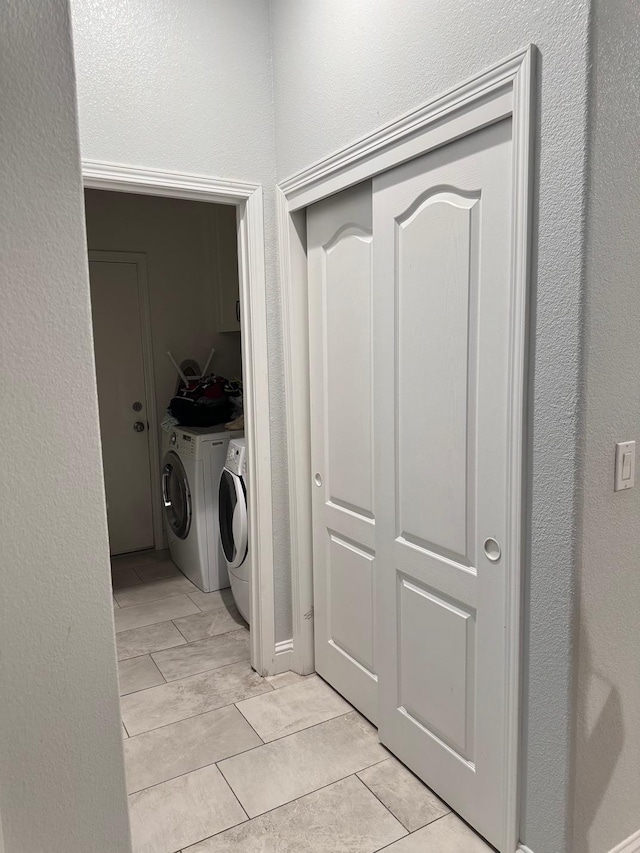 5357 E Burns, Fresno, CA 93725 - clothes washing area with washing machine and dryer, light tile patterned floors, and laundry area
