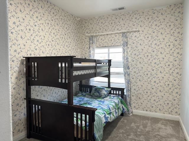 5357 E Burns, Fresno, CA 93725 - bedroom with carpet floors and wallpapered walls