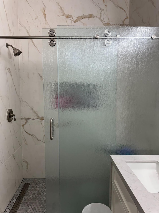 5357 E Burns, Fresno, CA 93725 - bathroom featuring a shower stall and vanity