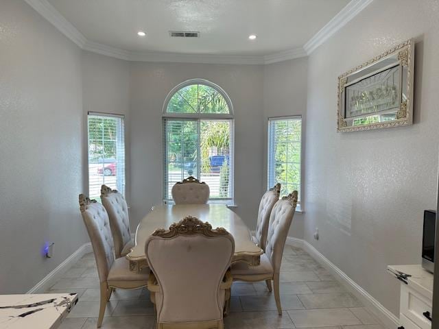 5357 E Burns, Fresno, CA 93725 - dining area featuring ornamental molding, recessed lighting, and light tile patterned floors