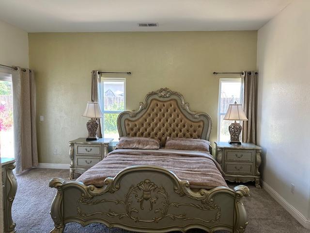 5357 E Burns, Fresno, CA 93725 - bedroom featuring carpet floors and multiple windows