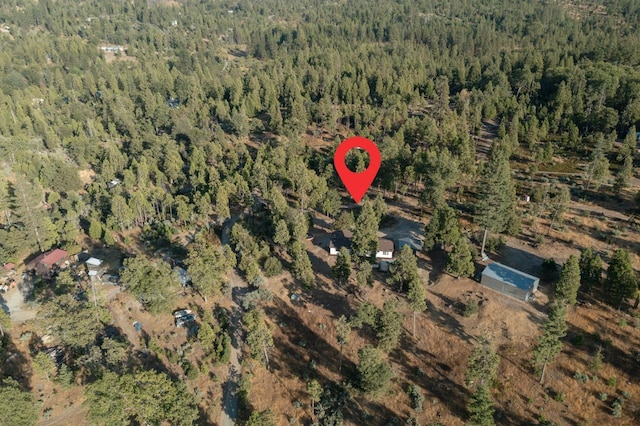 drone / aerial view with a view of trees