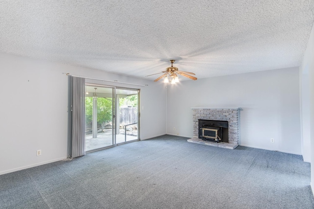 unfurnished living room featuring a ceiling fan, baseboards, and carpet