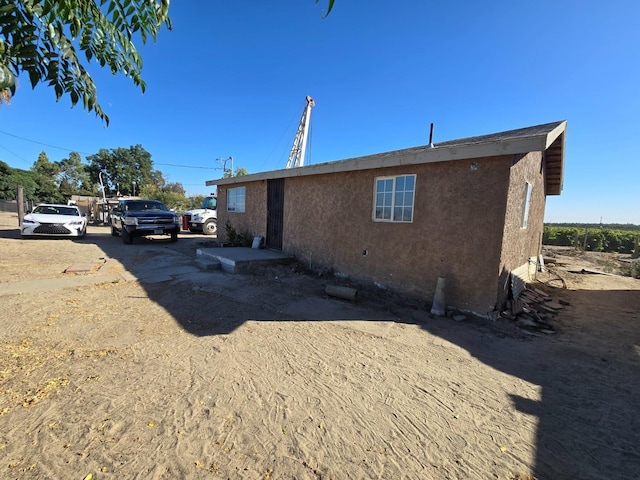 12441 S Henderson Rd, Caruthers, CA 93609 - view of side of property featuring stucco siding