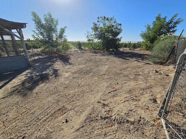 12441 S Henderson Rd, Caruthers, CA 93609 - view of yard featuring fence and a rural view