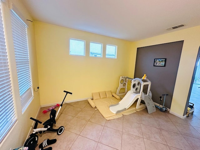 2148 S Villa Ave, Fresno, CA 93727 - game room with visible vents, baseboards, and light tile patterned floors