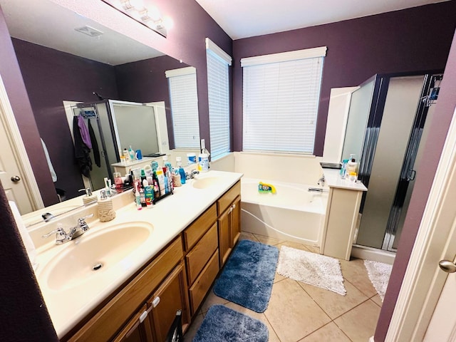2148 S Villa Ave, Fresno, CA 93727 - bathroom with a garden tub, visible vents, tile patterned flooring, and a stall shower