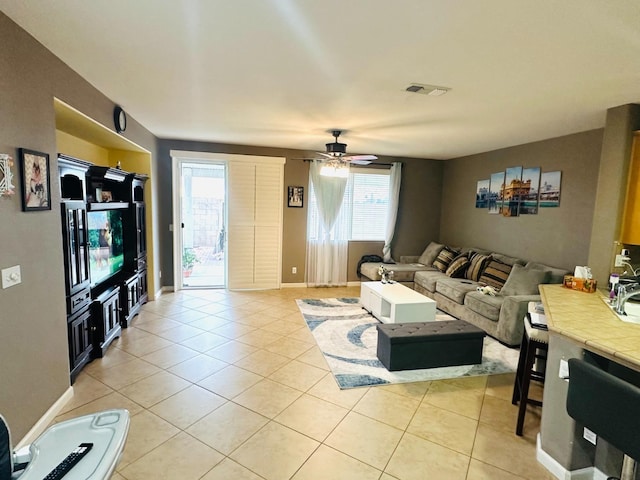 2148 S Villa Ave, Fresno, CA 93727 - living area with a wealth of natural light, ceiling fan, and light tile patterned flooring