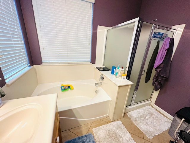 2148 S Villa Ave, Fresno, CA 93727 - full bath featuring vanity, a garden tub, tile patterned flooring, and a stall shower