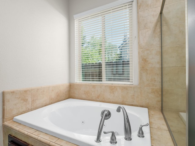 1026 E Carnoustie Ave, Fresno, CA 93730 - bathroom with a tub with jets