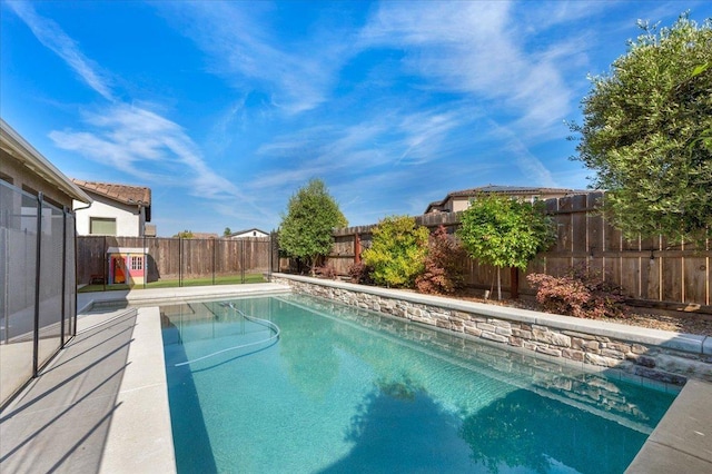 2653 Vermont Ave, Clovis, CA 93619 - view of swimming pool with a fenced backyard