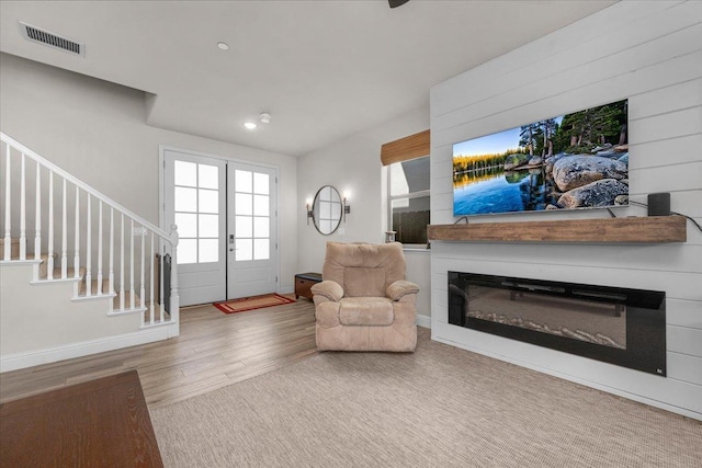 2653 Vermont Ave, Clovis, CA 93619 - living area with wood finished floors, stairway, baseboards, and recessed lighting