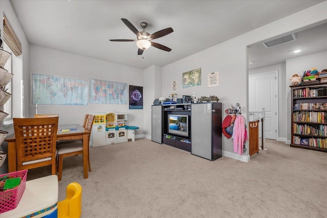 2653 Vermont Ave, Clovis, CA 93619 - recreation room with a ceiling fan, carpet floors, and baseboards