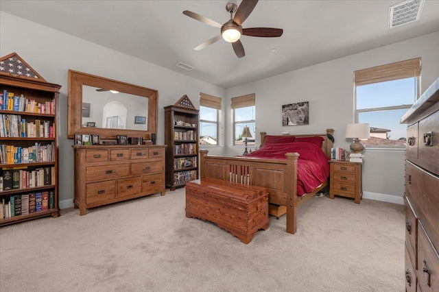 2653 Vermont Ave, Clovis, CA 93619 - carpeted bedroom with multiple windows, baseboards, and a ceiling fan