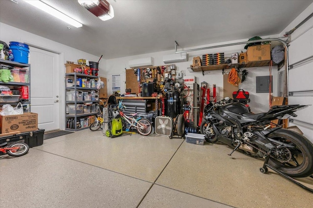2653 Vermont Ave, Clovis, CA 93619 - garage featuring a garage door opener and electric panel