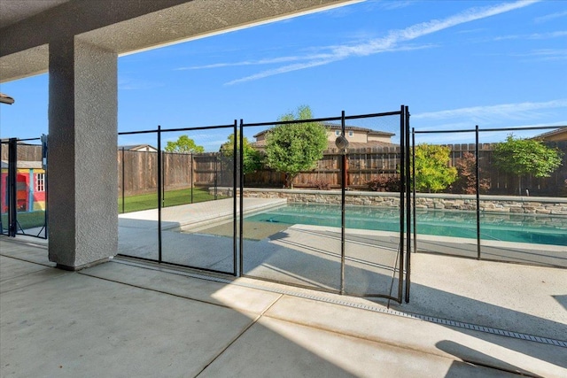 2653 Vermont Ave, Clovis, CA 93619 - view of swimming pool with a patio and a fenced backyard