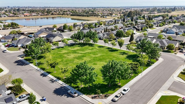aerial view with a residential view and a water view