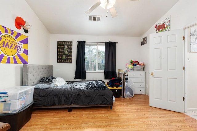 3617 Clay Ct, Selma, CA 93662 - bedroom with light wood-style flooring, visible vents, vaulted ceiling, and ceiling fan