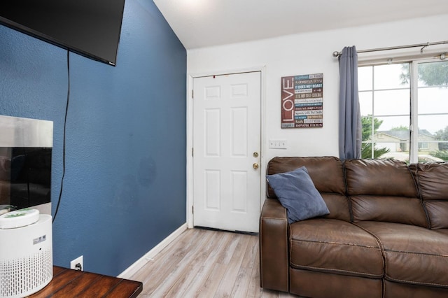 3617 Clay Ct, Selma, CA 93662 - living area with light wood-style flooring, baseboards, and a textured wall