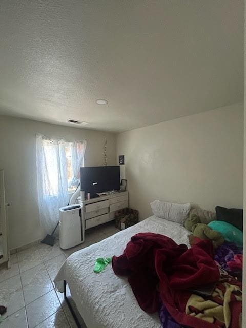 1197 Mulberry, Parlier, CA 93648 - bedroom featuring light tile patterned floors